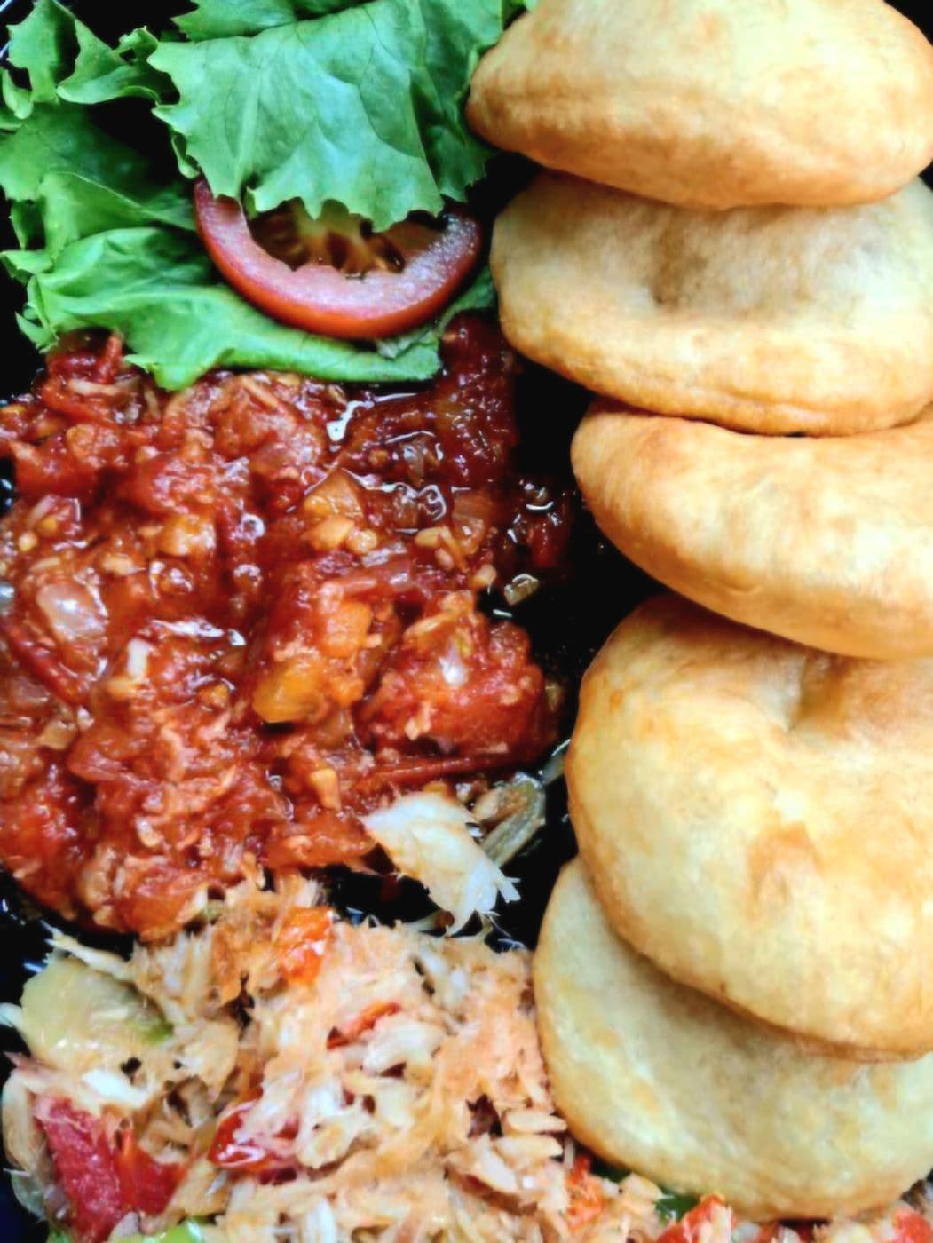 Fry bake with saltfish and fresh salad