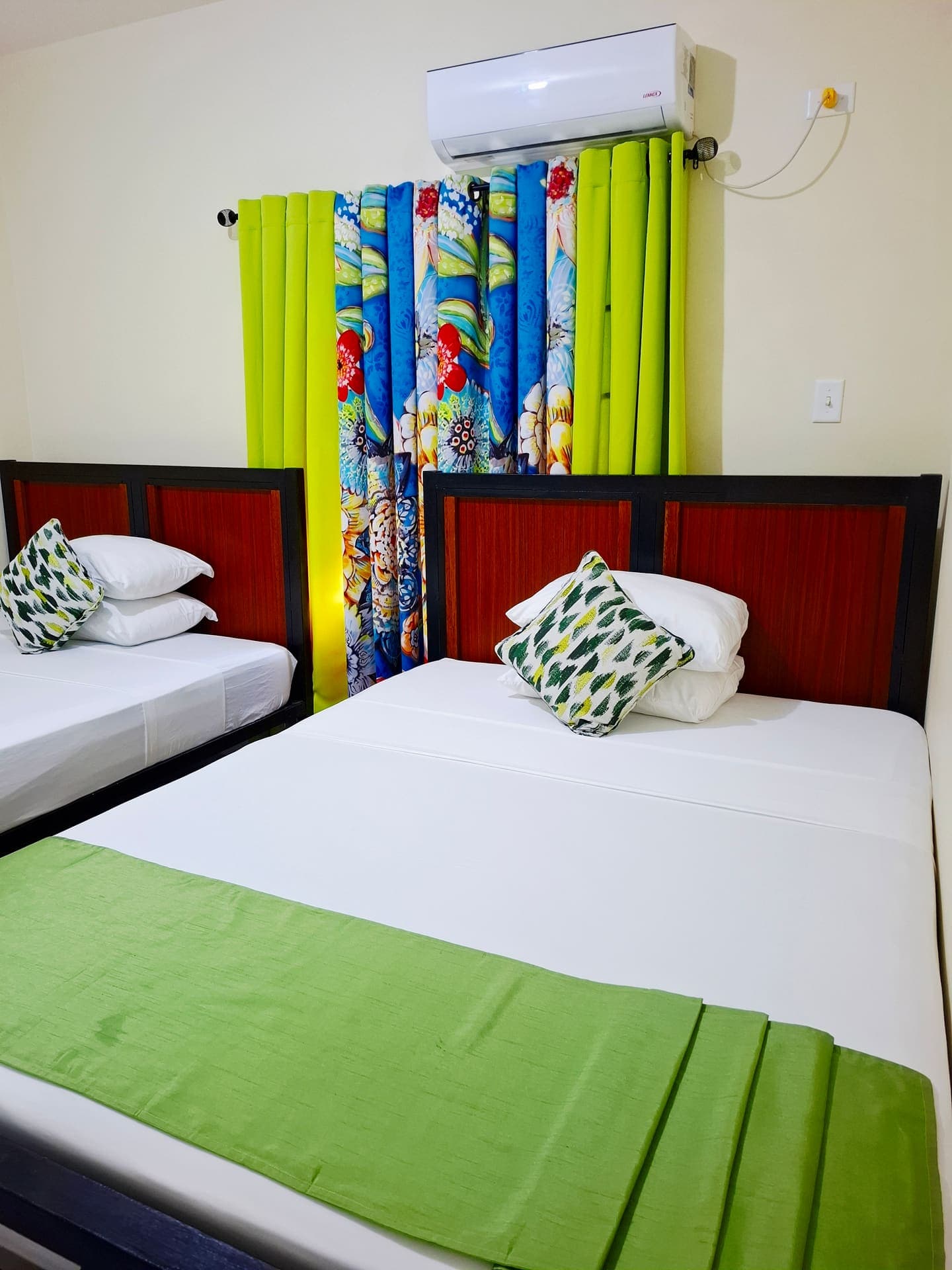 Bedroom with bright green bedspread